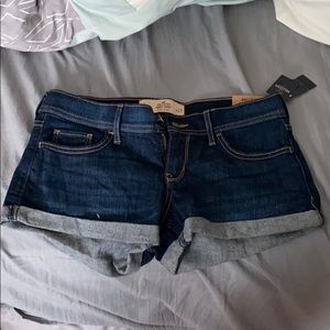 Hollister low rise short-short dark colored.